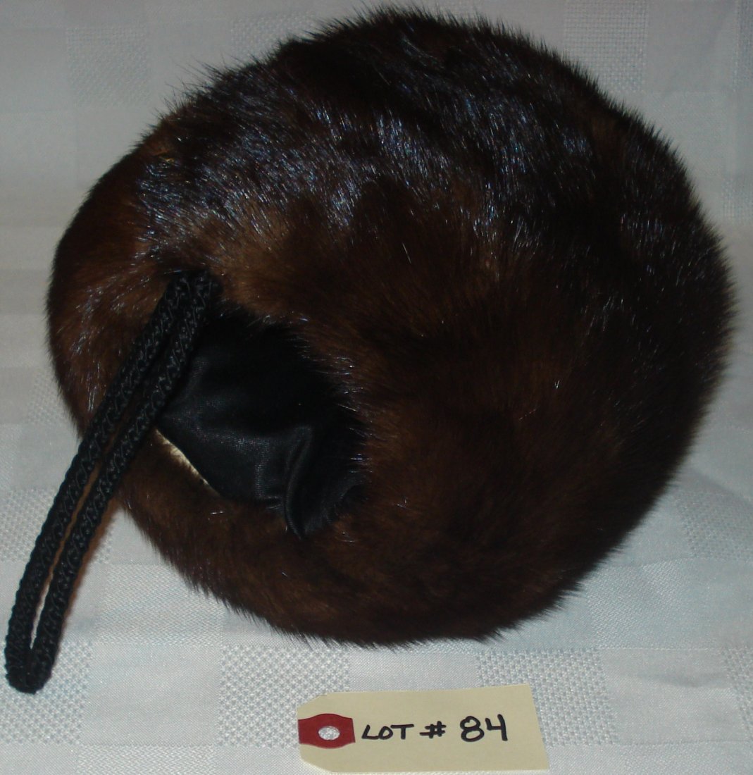 mink hand muff: vintage mink hand warmer muff with chord and outside pocket with zipper. in box.