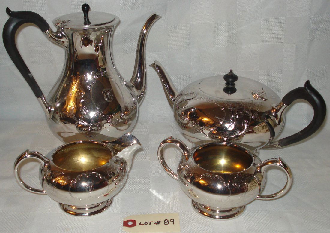 4-piece Birks silver tea set: 4-piece Birks silver tea set:1 tea pot with lid, 1 coffee pot with lid, 1 sugar bowl, 1 cream/milk jug (signed at bottom).