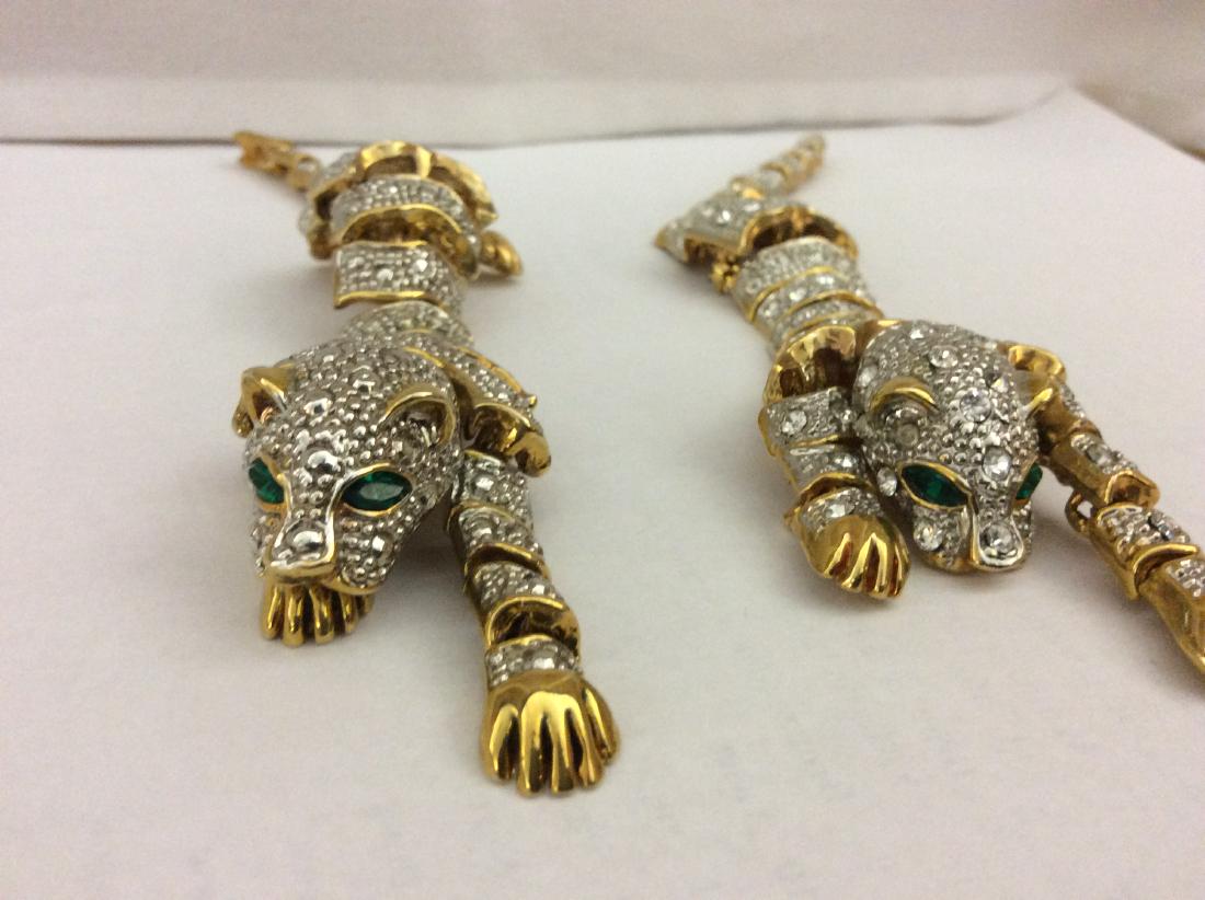 Pair of Panther Brooches w/ Green Eyes: Elegant costume jewelry pieces.