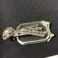 Pocket or Hair Pin Converts to Opera Glasses Trigger on: Trigger on the side opens the glasses for viewing the opera