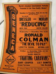 An Original Shea's Seneca Poster Seneca at Cazenovia: Seneca at Cazenovia Poster. Fighting Caravans, with Gary Cooper. This piece measures 22 inches tall x 14 inches accross.
