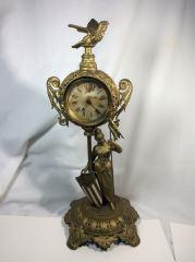 French Liberty Clock Made as an honorarium to the USA,: Made as an honorarium to the USA, non-working, winds up and begins to run but then stops. Measures 21" tall base is 10" accross, & clock face is 4", the clock & flag are removeable for shipping purpos