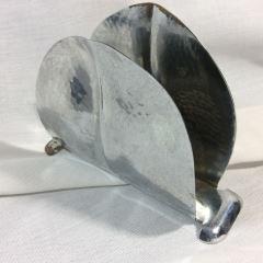 Sweden Ale Chrome Napkin Holder Fabulous hammered leafy: Fabulous hammered leafy design, circa 1930s Sporting leafy design and hammered texturing, measures 3/4" tall x 4 1/2" long.