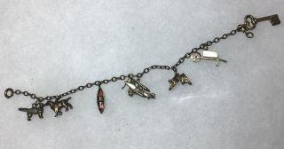 Sterling Charm Bracelet Charms are: Plane, Canoe, Key,: Charms are: Plane, Canoe, Key, Baby Shoe & wheelbarrow.