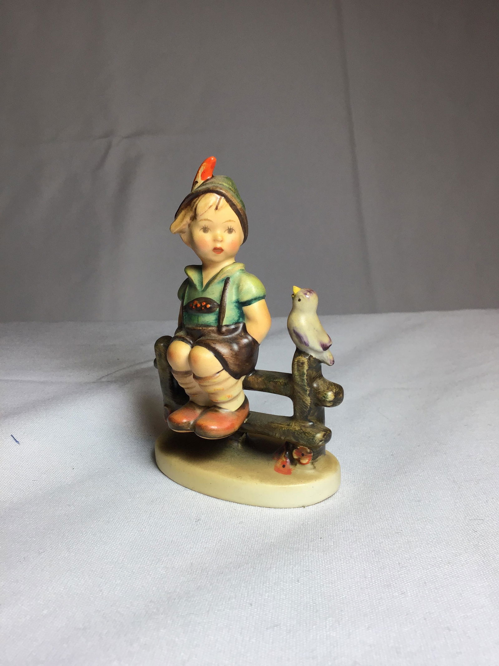 Fence sitting boy  Hummel 111 3/0 (1 of 4)