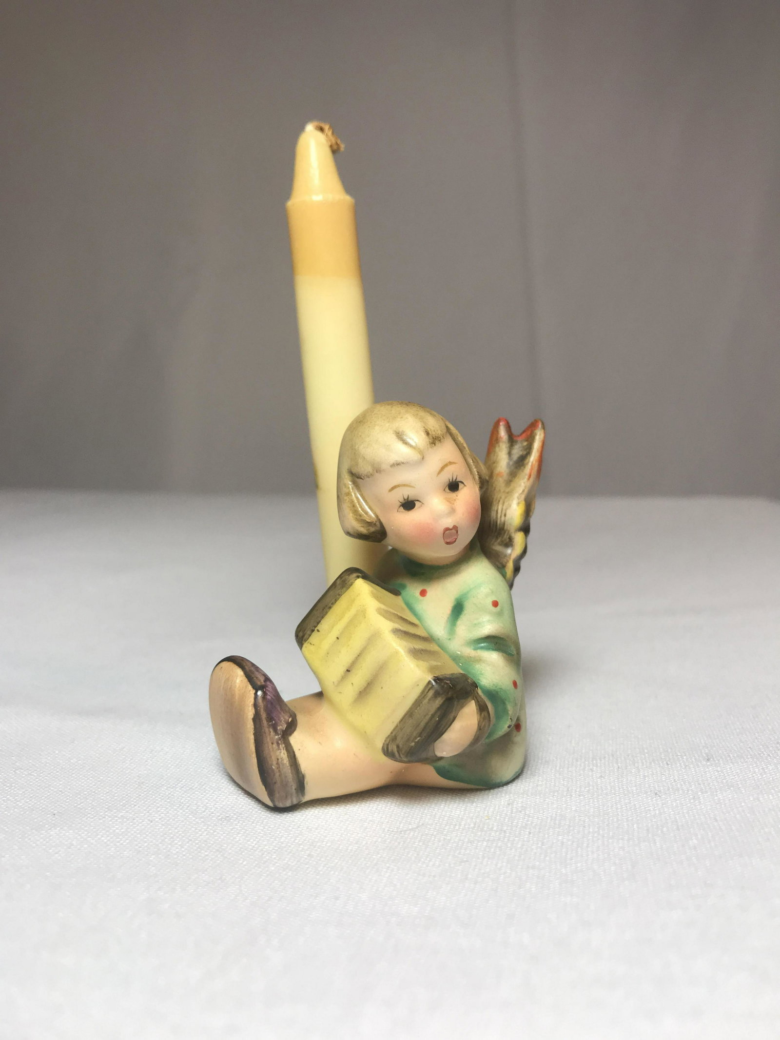 Hummel sitting angel candleholder 4.5?Â: .