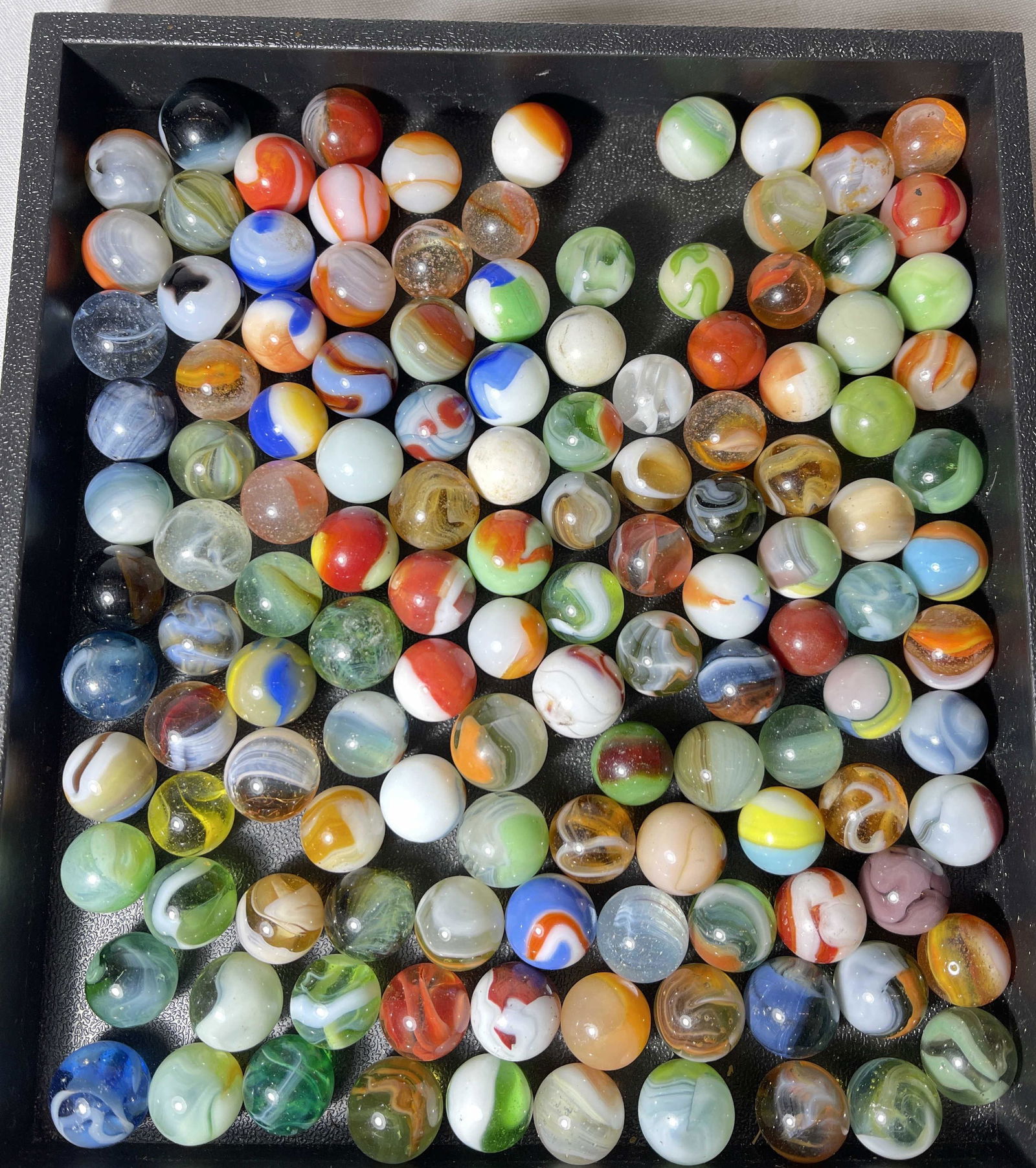 125 Machine made Marbles: .