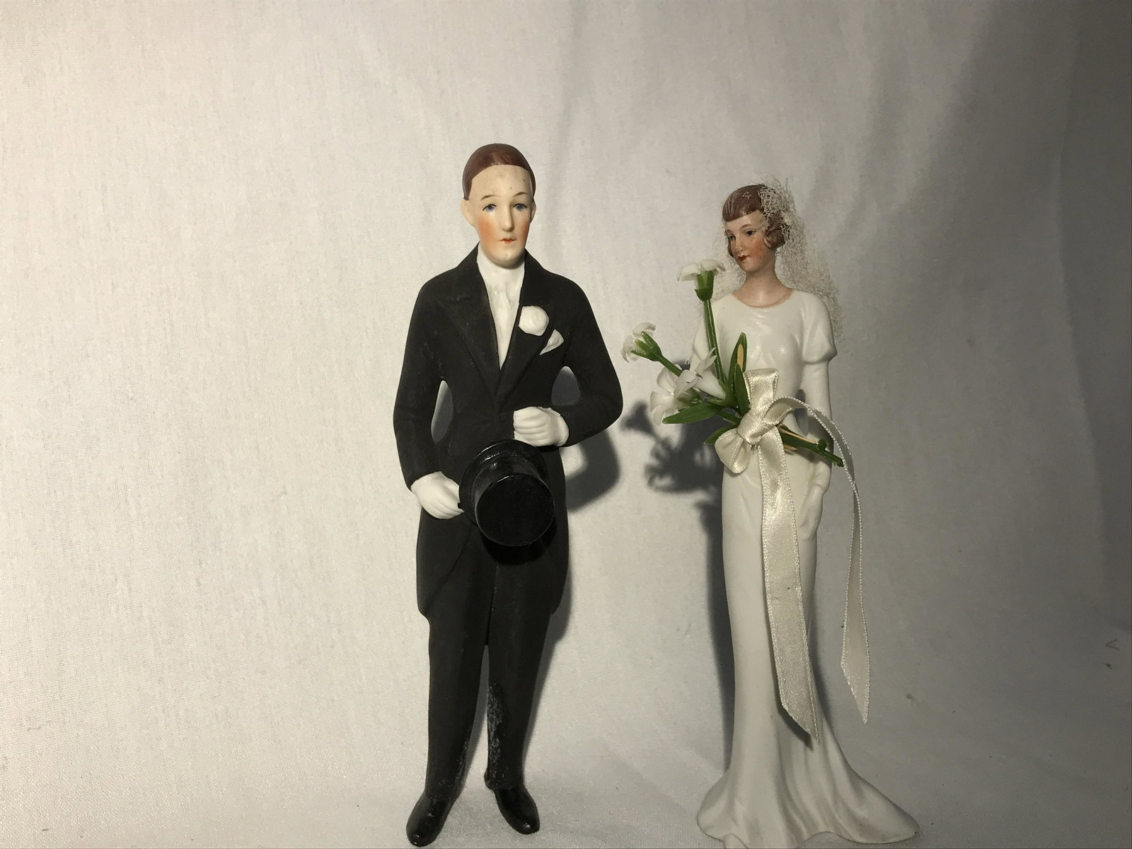 Bride and Groom Porcelain Cake Toppers Groom measures: Groom measures 6.5 inches tall