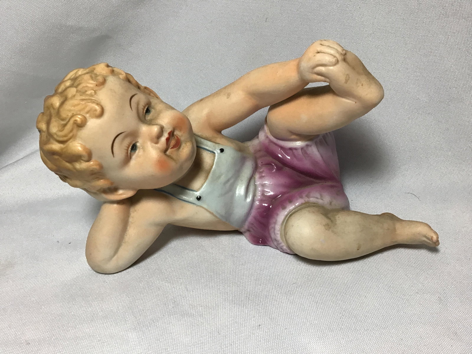 Piano Baby marked Measures 8 inches wide: Measures 8 inches wide