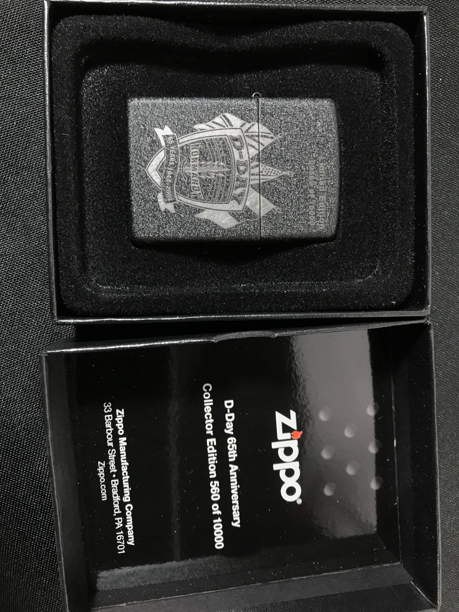 D-day Zippo lighter 65th Anniversary LE number 560 of: LE number 560 of 1000 Measures 3 inches by 4 inches