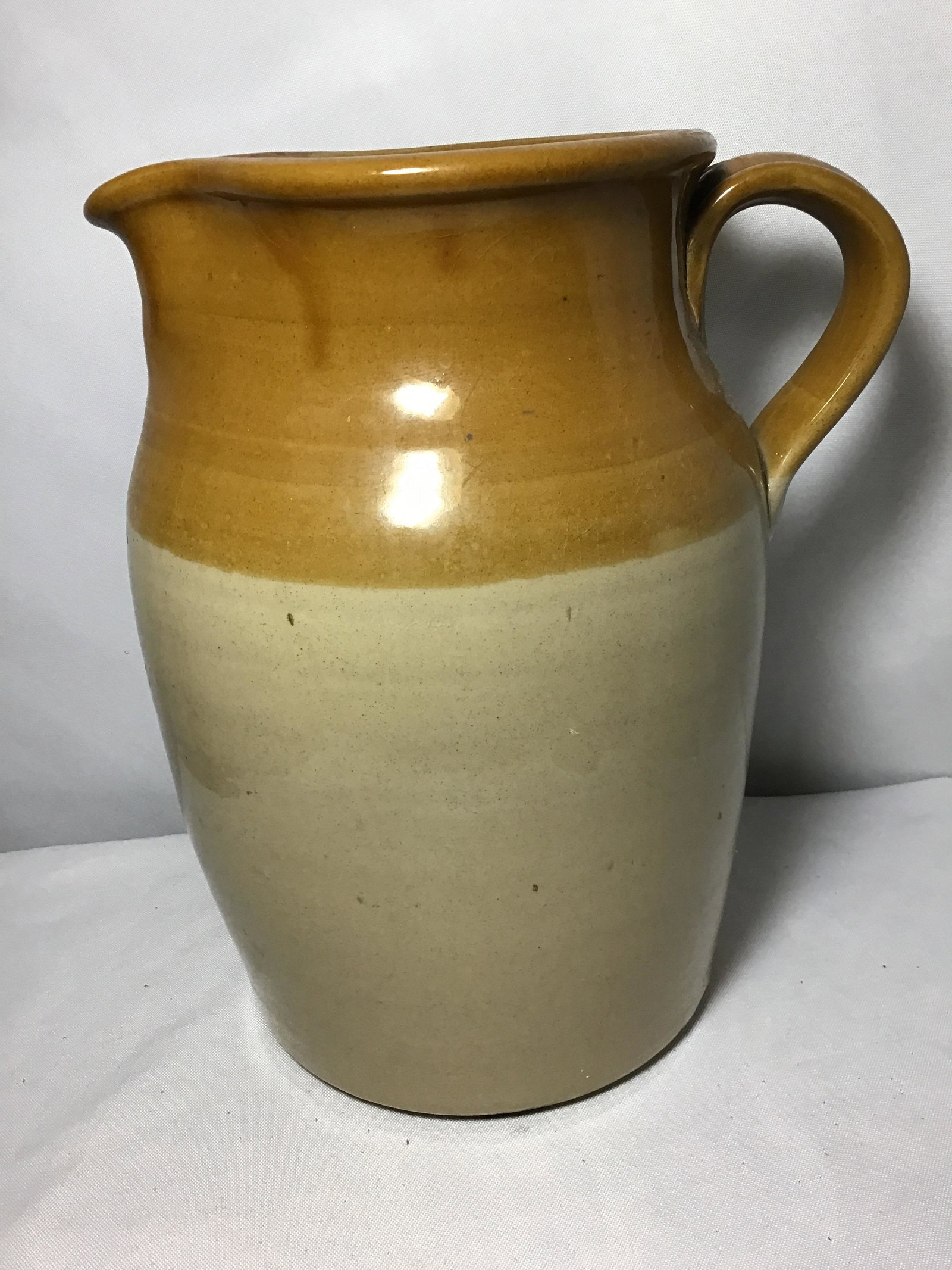 Crock Style Earthtone Pitcher Measures 11 inches tall: Measures 11 inches tall