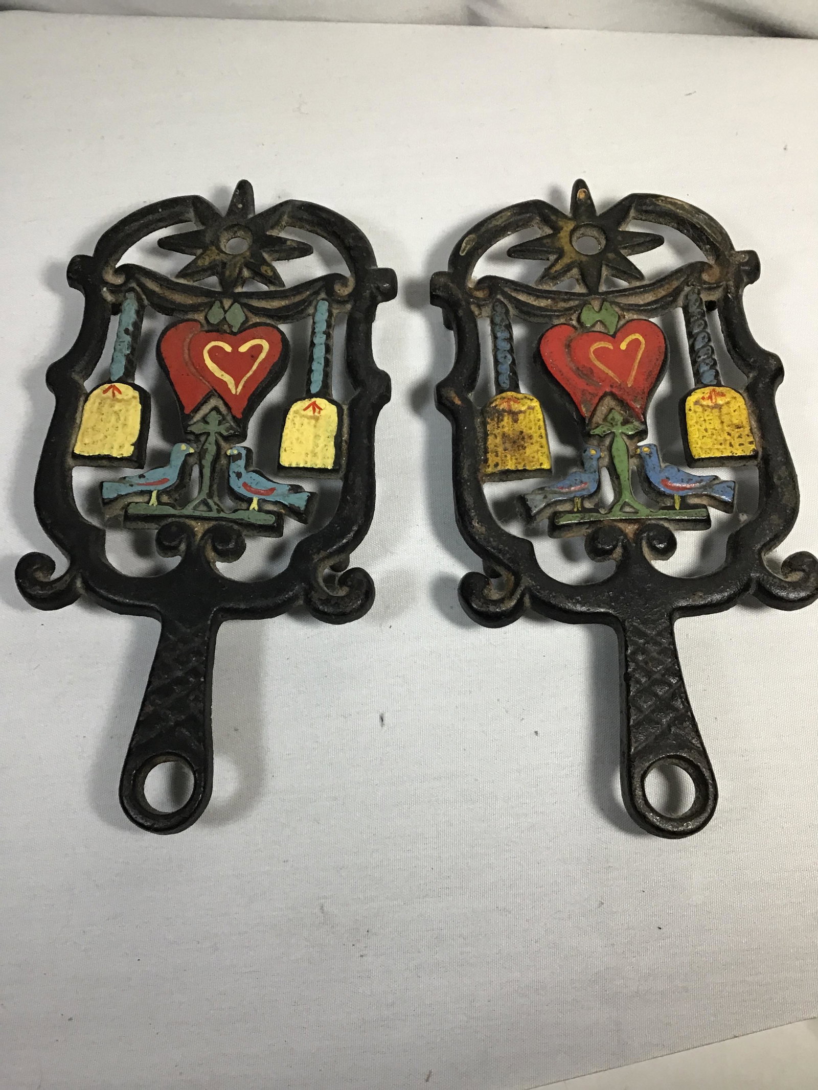 Pair of Trivets - Cast Iron Each measures 9 inches: Each measures 9 inches