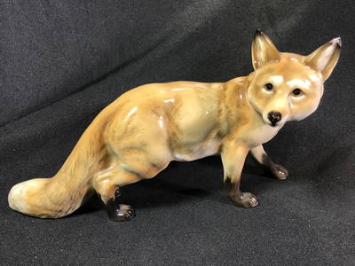 Porcelain Fox measures 5 inches tall by 9.5 inches wide