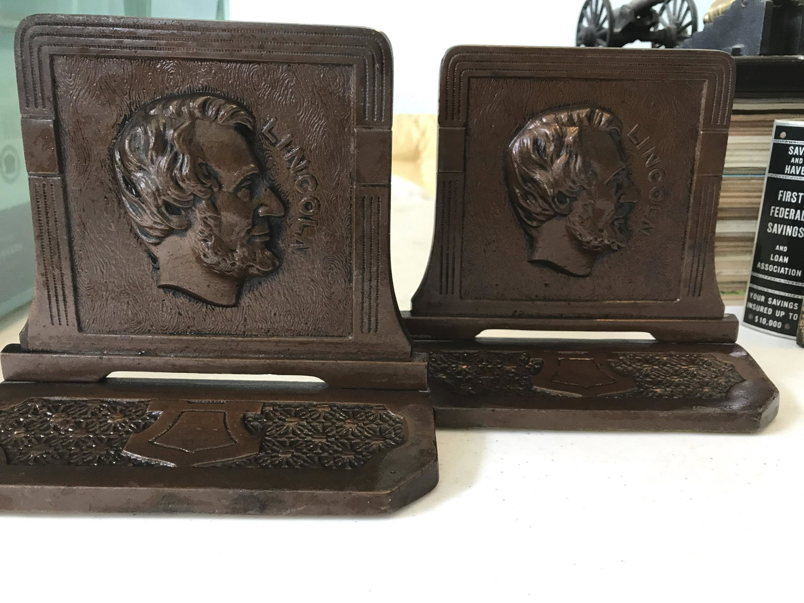 Vintage Iron Lincoln bookends measures to be 6â€ by 5 1/2â€œ x 3â€œ: measures to be 6” by 5 1/2â€œ x 3â€œ
