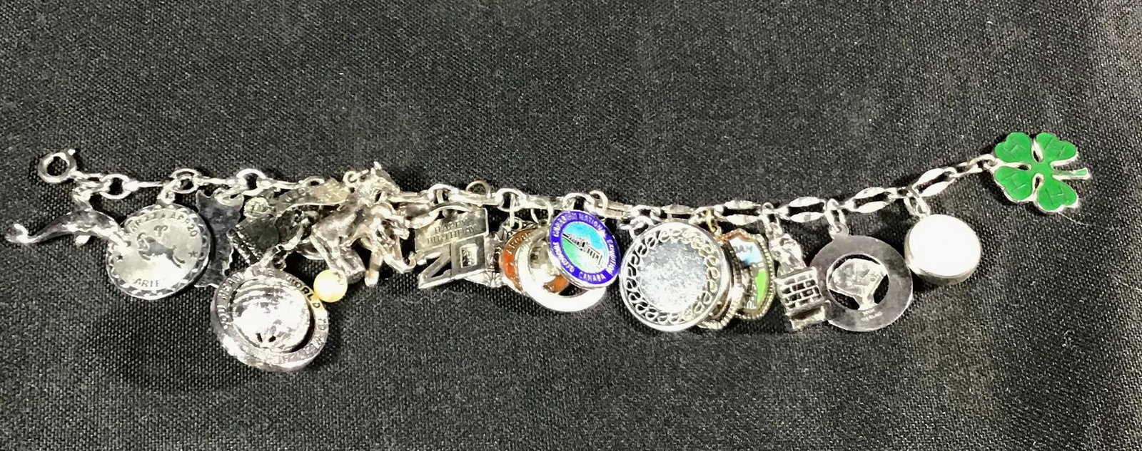 Vintage sterling charm bracelet .: .