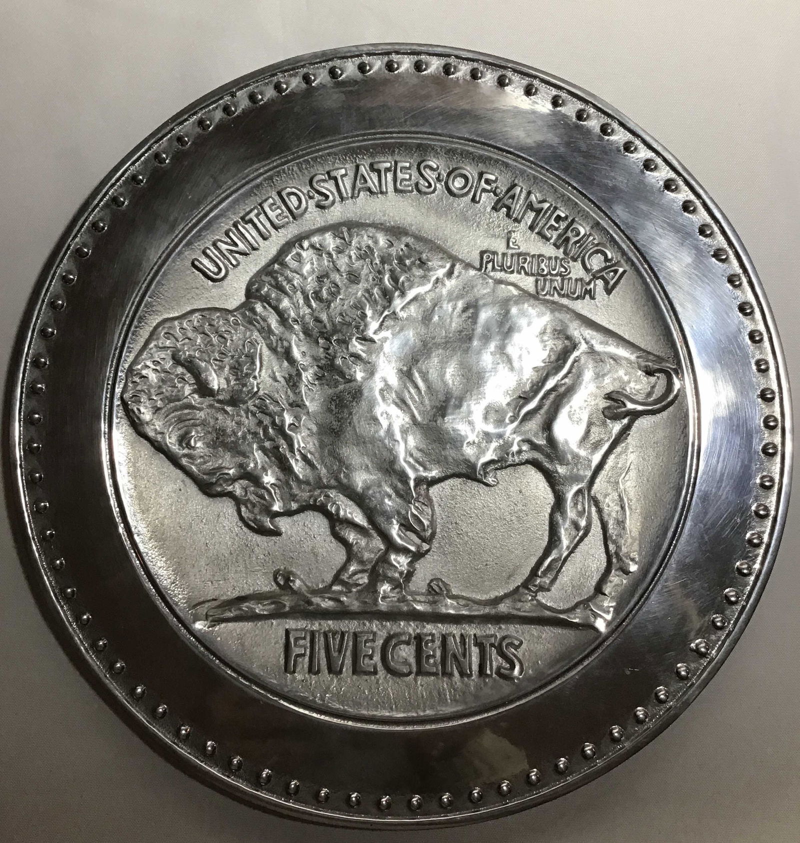 A Buffalo five Cent Plate by Robert Garrison 1995 height 13 inches (1 of 4)