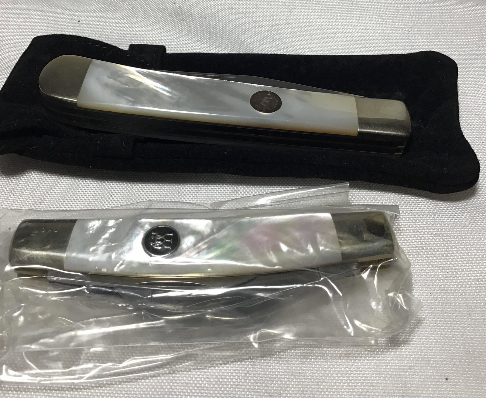 Vintage Pocket Knives (2) one with soft case . (1 of 3)