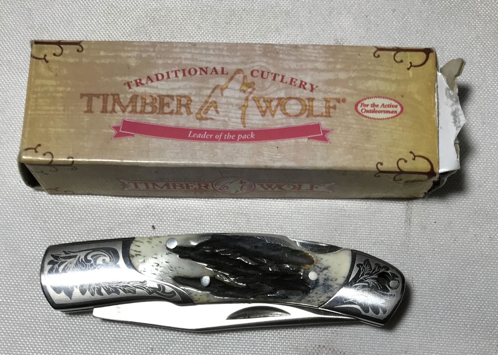 Timber Wolf Pocket Knife in org box . (1 of 2)