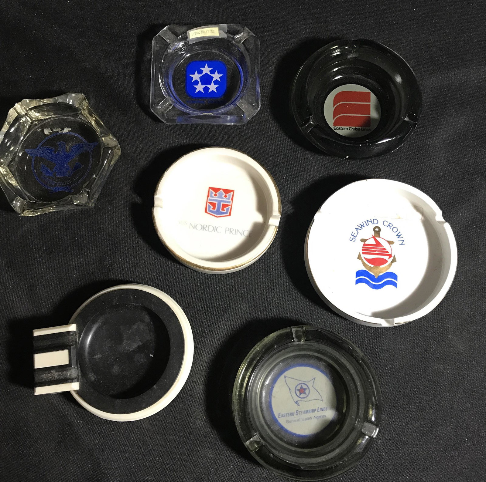 Ashtrays from Various Steamship Lines (7) including eastern steamship, Nordic prince, see you in a: including eastern steamship, Nordic prince, see you in a crown, eastern cruise lines, admiral cruises, and United States lines