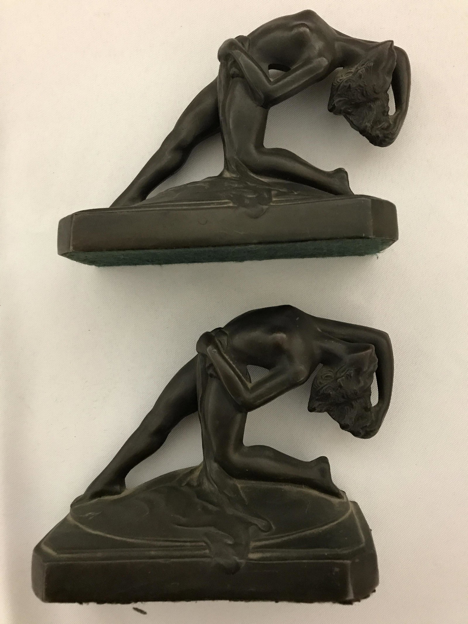 Frank Art Bookends: Each measures 6 inches wide by 5 inches tall
