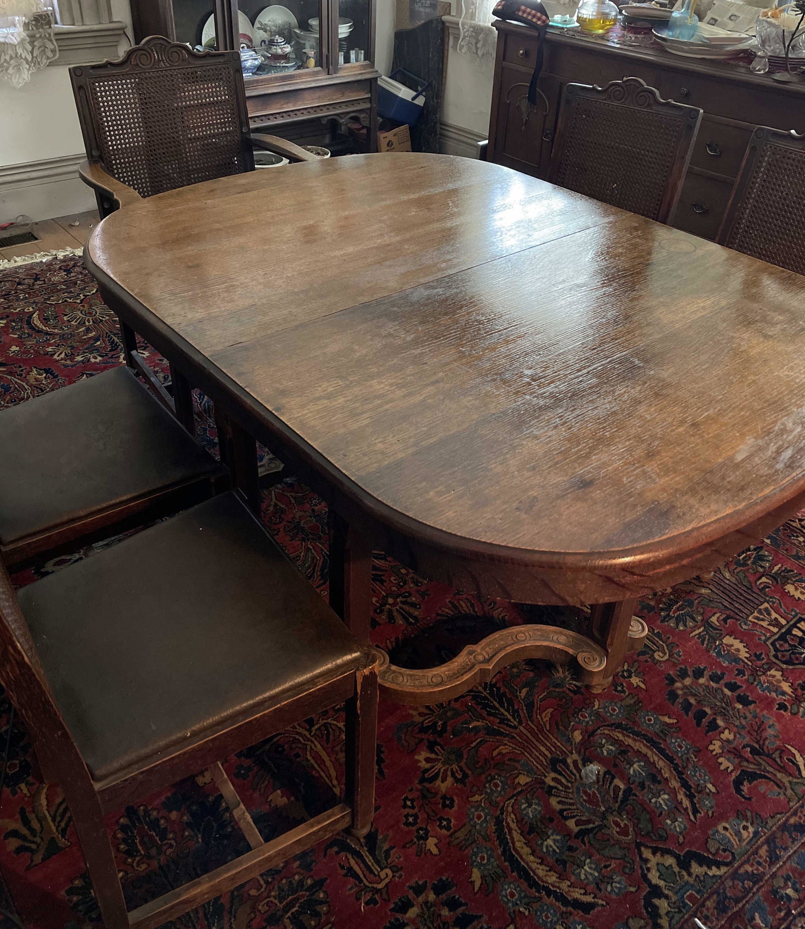 Antique Stickley Dining Room Set: Table with 3 leaves and five chairs, one with arms Oak All furniture needs to be picked up directly from the Estate in Rushford, NY. We will provide an exact address after items are won.