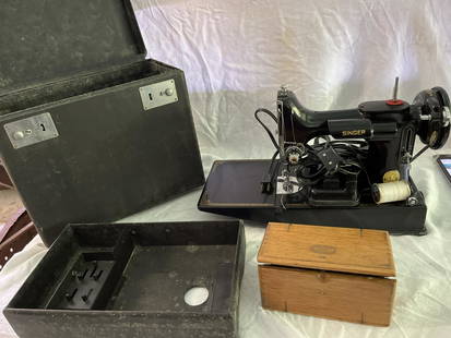 Singer Featherweight Sewing Machine: In original case, sewing machine is in good shape but case is a bit musty