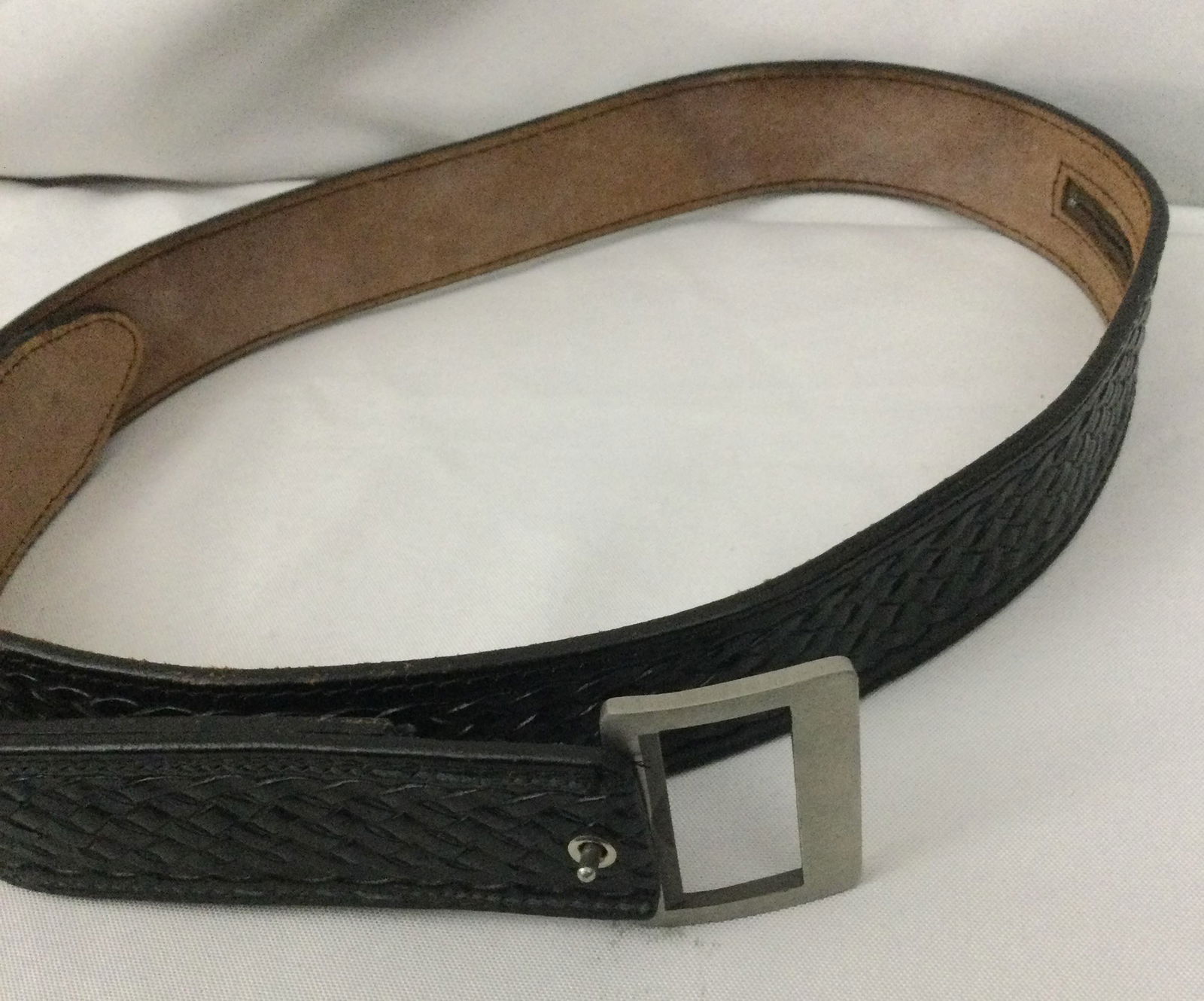 Bowen Belt Buckle Dagger: Buckle detaches as knife.