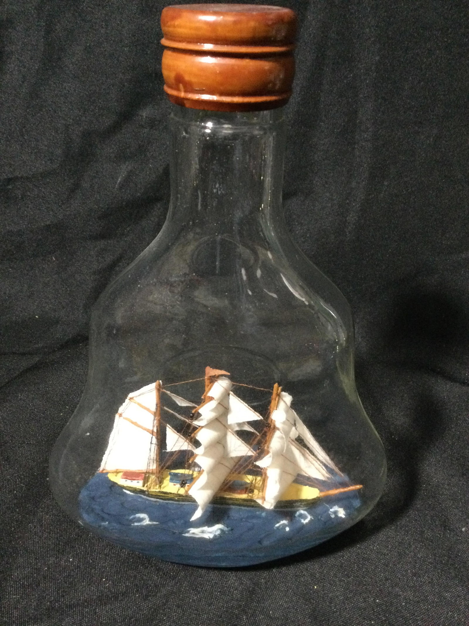 Vintage Ship in a Bottle: Nautical theme measures 9 inches high by 6 inches at the base