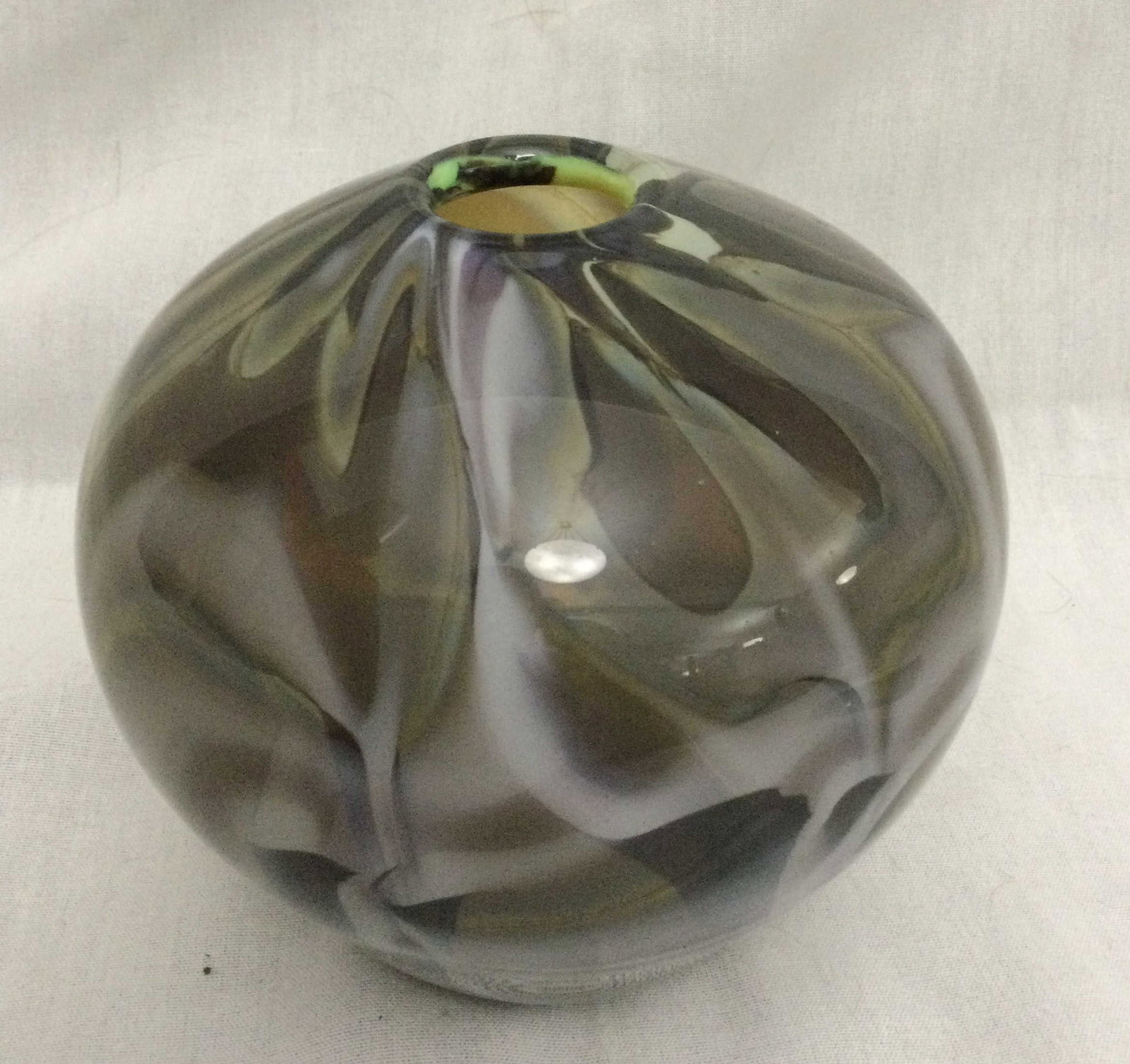 Art glass Handblown Iridescent Vase -Signed: measure 6 1/4 x 6 inches at widest point signed on bottom1 1/4 inch hole at top