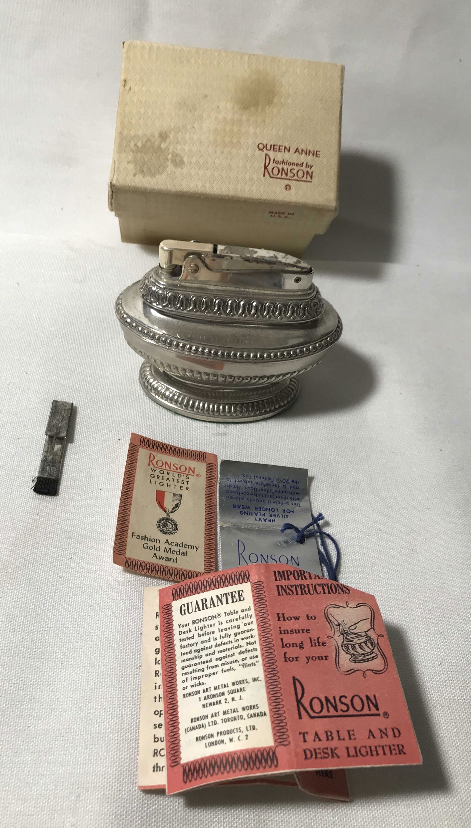 Ronson Queen Anne Table & Desk Lighter with: paperwork. 2 1/2 inches tall ,in original box.
