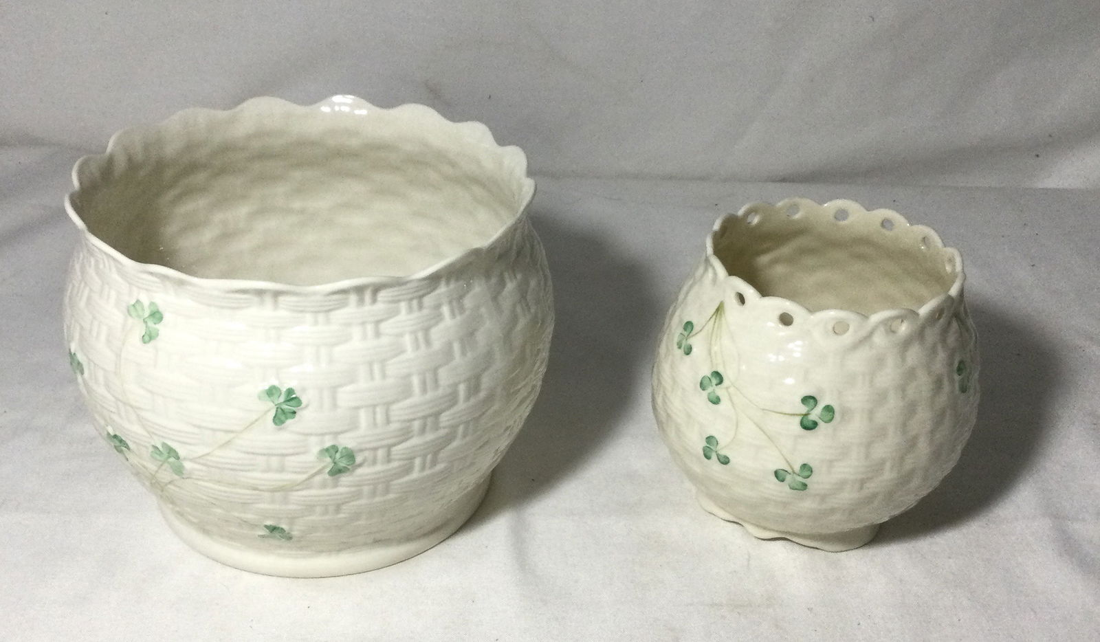 Belleek Planter & Basket - Shamrock Design: both exhibit the woven basket design.Planter is 5 1/2 inches high and 6 1/2 across basket is four and three-quarter inches high with a 3 1/2 inch opening