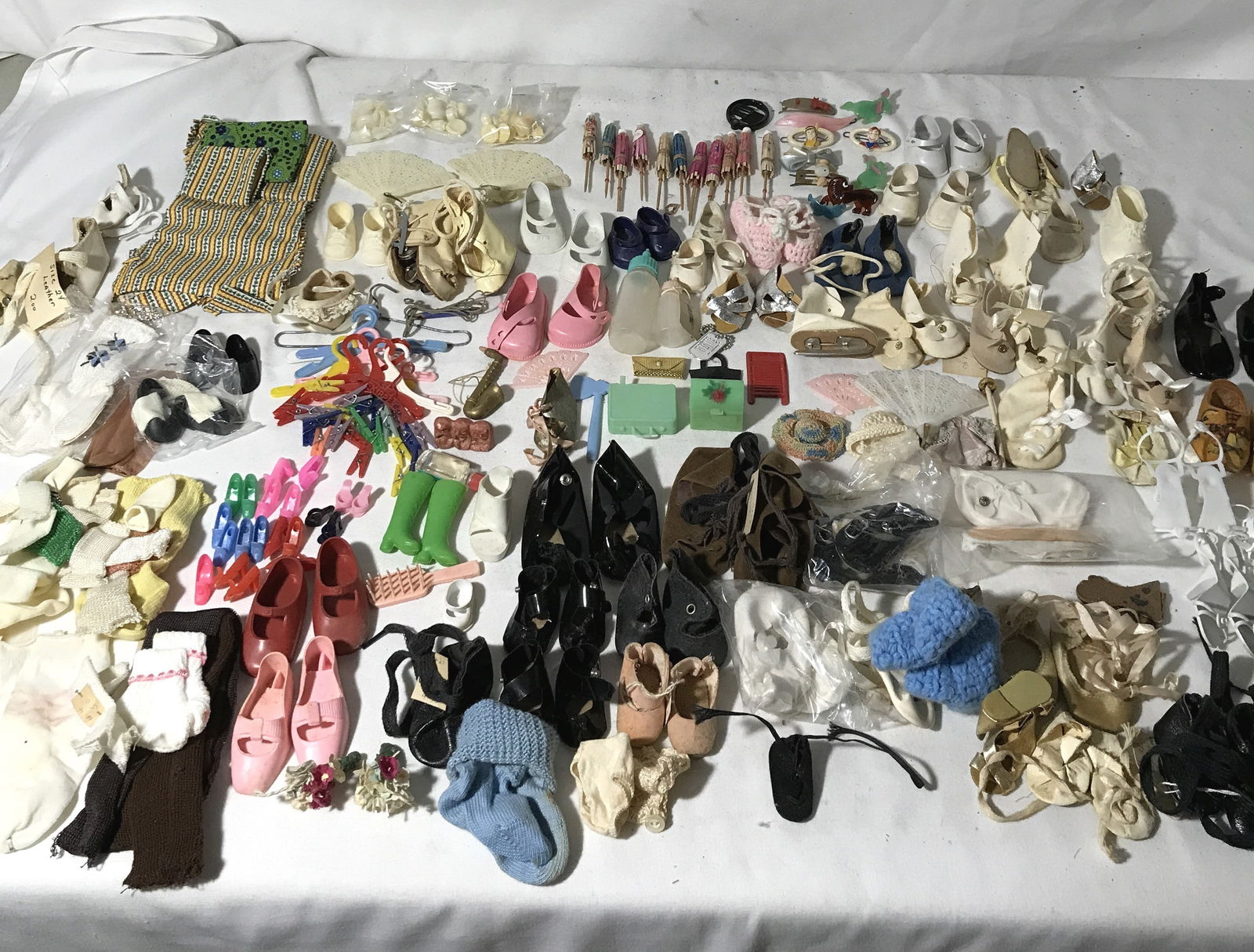 Doll Accessories, smaller dolls, like Barbie and: larger dolls, Includes socks, smaller and larger shoes, hangers, bedsheet, all kinds of shoes