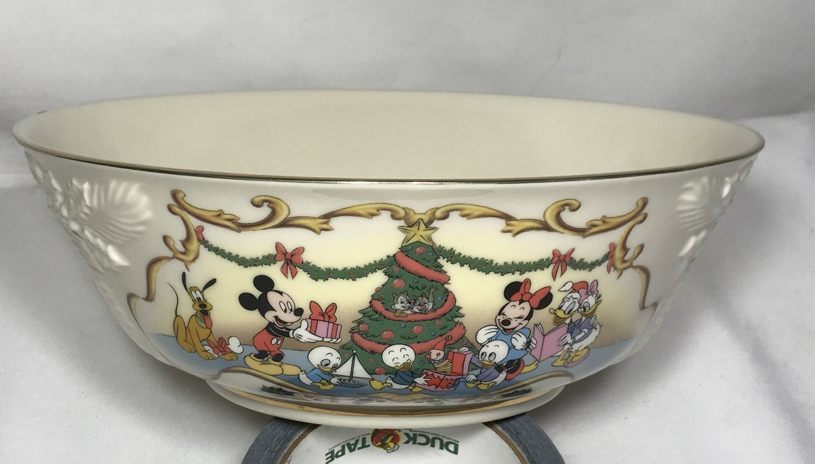Lenox Disney Mickey’s Merry Christmas Bowl: 1997, Disney fine ivory china, Measures 9 1/2 inches in diameter, in good condition no chips or cracks visible