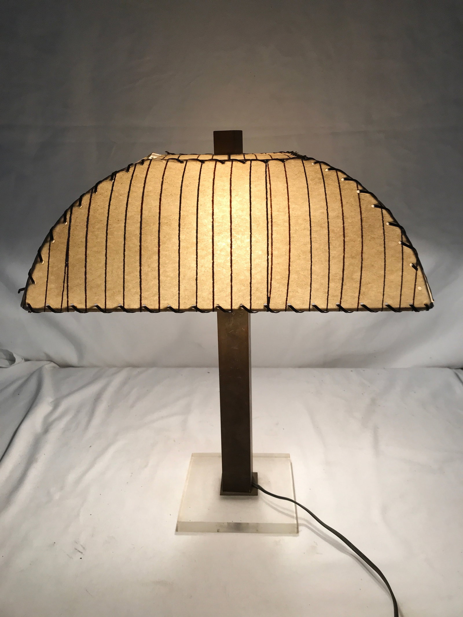 Vintage Brass and Plexi Glass Table Lamp: 2 bulbs with pull chains, Measures 19 inches tall and a vintage paper lampshade with leather like stitching, Measures 19 inches tall shade measures 14 x 14 works fine