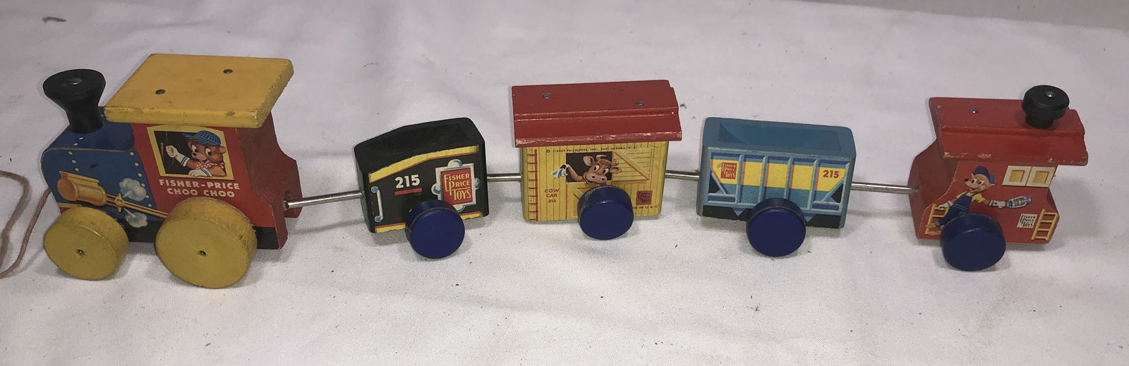 Vintage Fisher Price Choo Choo Pull Toy: Wooden Train, measures 16 inches by 3.5 inches by 2 inches.