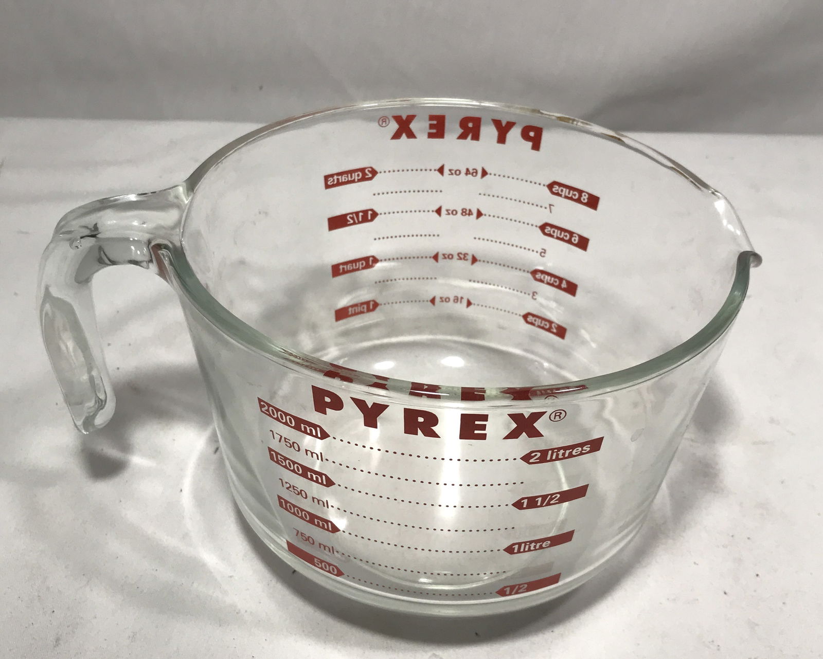 Pyrex Measuring / Mixing Bowl: Holds up to 64oz, measures 9 1/2 inches x 8 inches x 5 1/2 inches