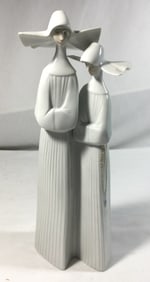 Lladro figurine of two nuns with crossed arms