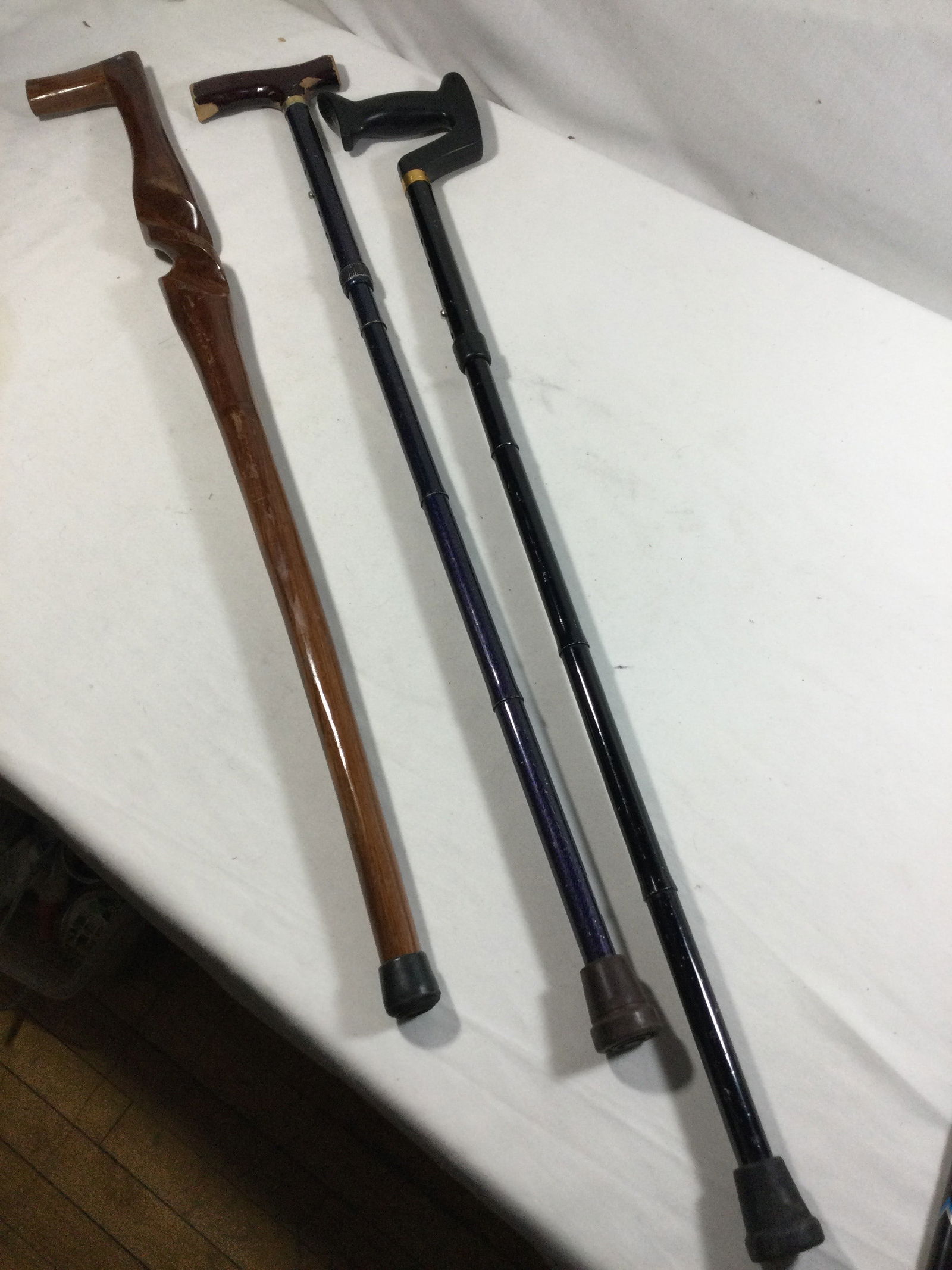 Cane Collection (3) one wood & the others metal (1 of 3)