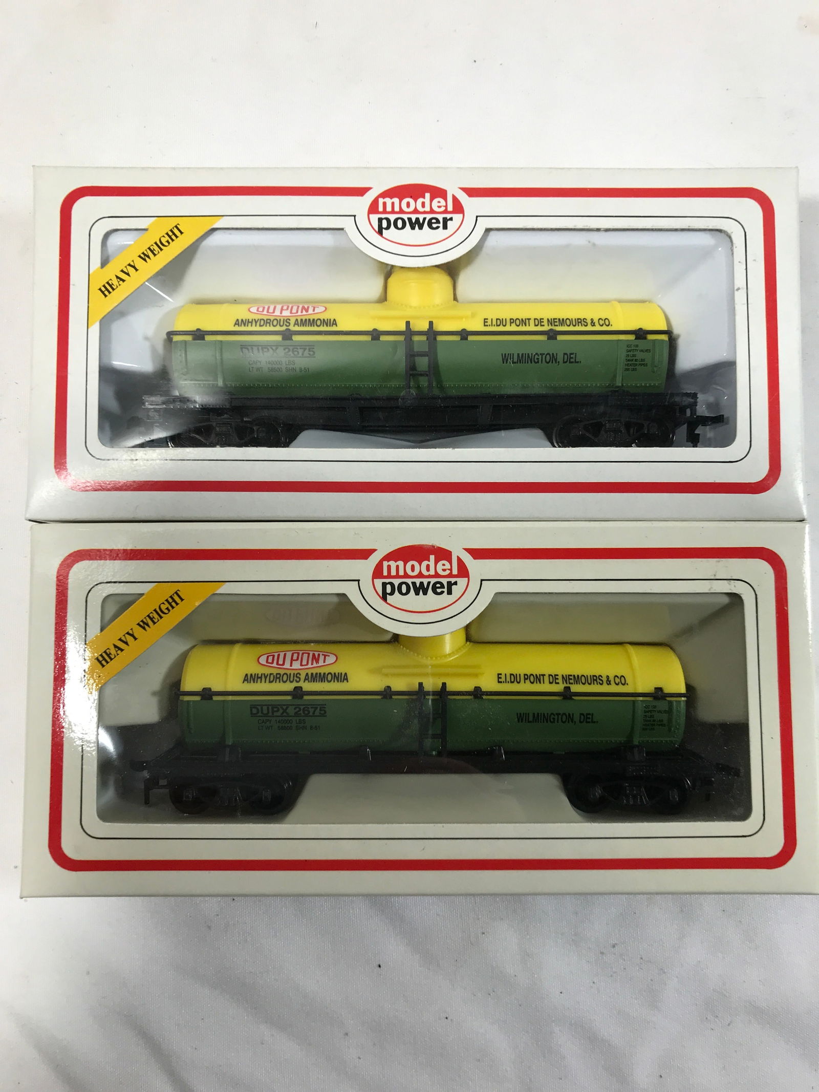 HO Scale DuPont Chemical Tank Cars (2): Model power, new in original boxes