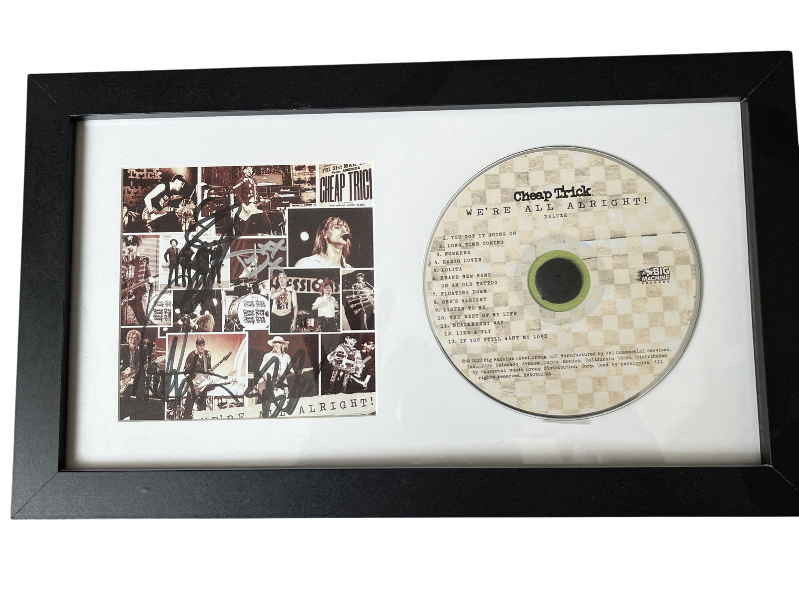 CHEAP TRICK WE'RE ALL ALRIGHT! AUTOGRAPHED DELUXE CD AND BOOKLET DISPLAY: This professionally presented memorabilia display features the deluxe edition CD and accompanying booklet from Cheap Trick's 2017 studio album, We're All Alright! Released by Big Machine Records,