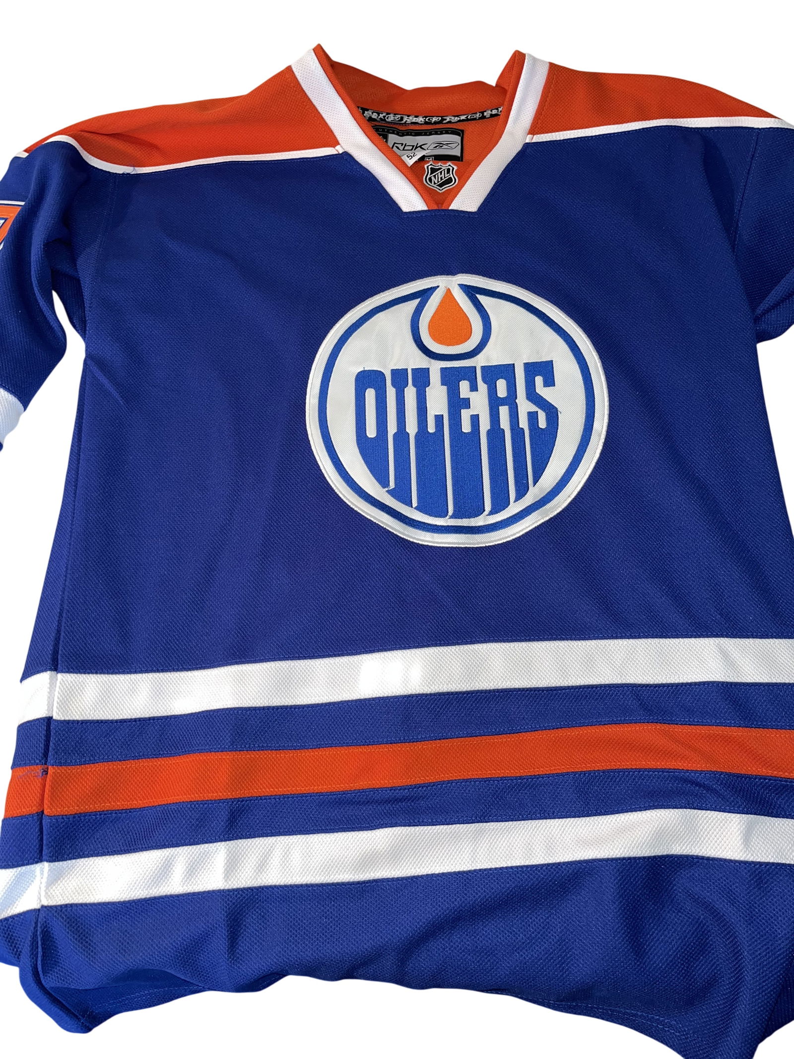Connor McDavid Edmonton Oilers Reebok Authentic Center Ice Collection Home Jersey Size 52: This is a Reebok Authentic Edmonton Oilers home hockey jersey featuring the name and numbers of star player Connor McDavid. The blue jersey is a size 52 and features tackle-twill stitched lettering