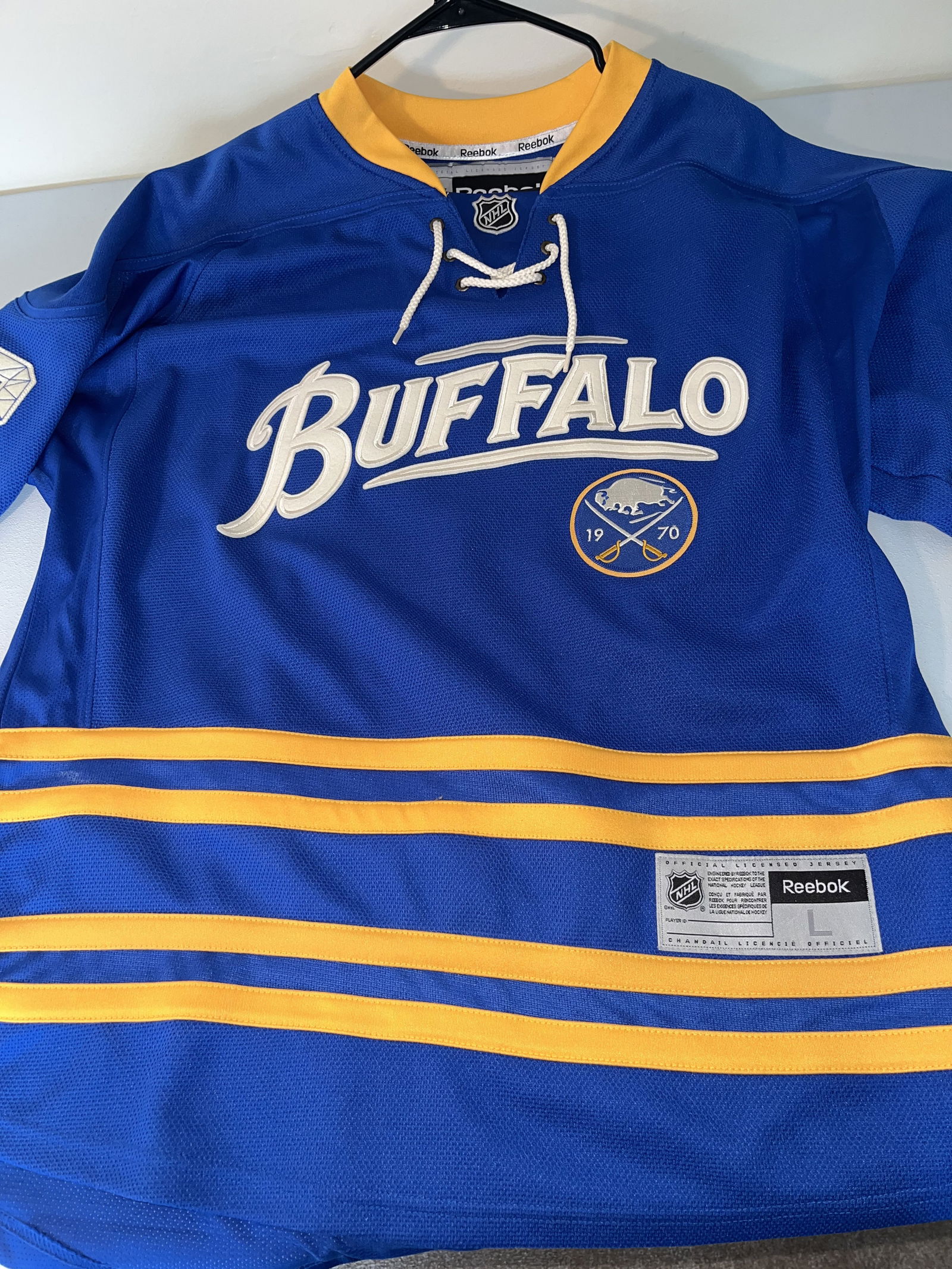 Jordan Leopold Buffalo Sabres Reebok 40th Anniversary Alternate Premier Jersey, New with Tags: This is an officially licensed Buffalo Sabres 40th Anniversary alternate Premier replica jersey manufactured by Reebok. The jersey features the name and number of defenseman Jordan Leopold (#3), who