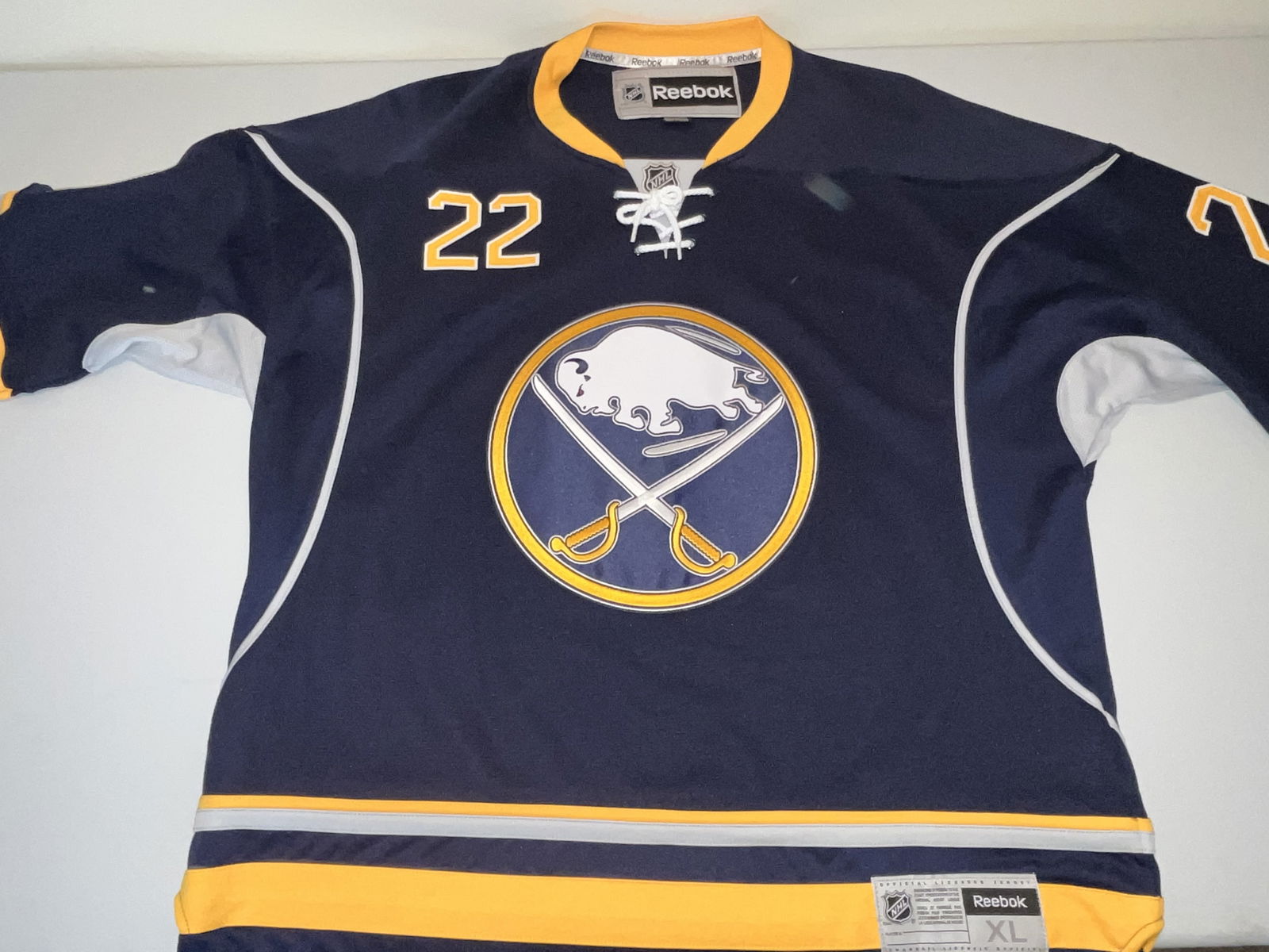 Brad Boyes Buffalo Sabres Reebok Premier NHL Jersey, XL: This is an officially licensed Buffalo Sabres home replica jersey manufactured by Reebok, featuring the name and number of forward Brad Boyes. The jersey is designed in the team's navy blue, gold, and