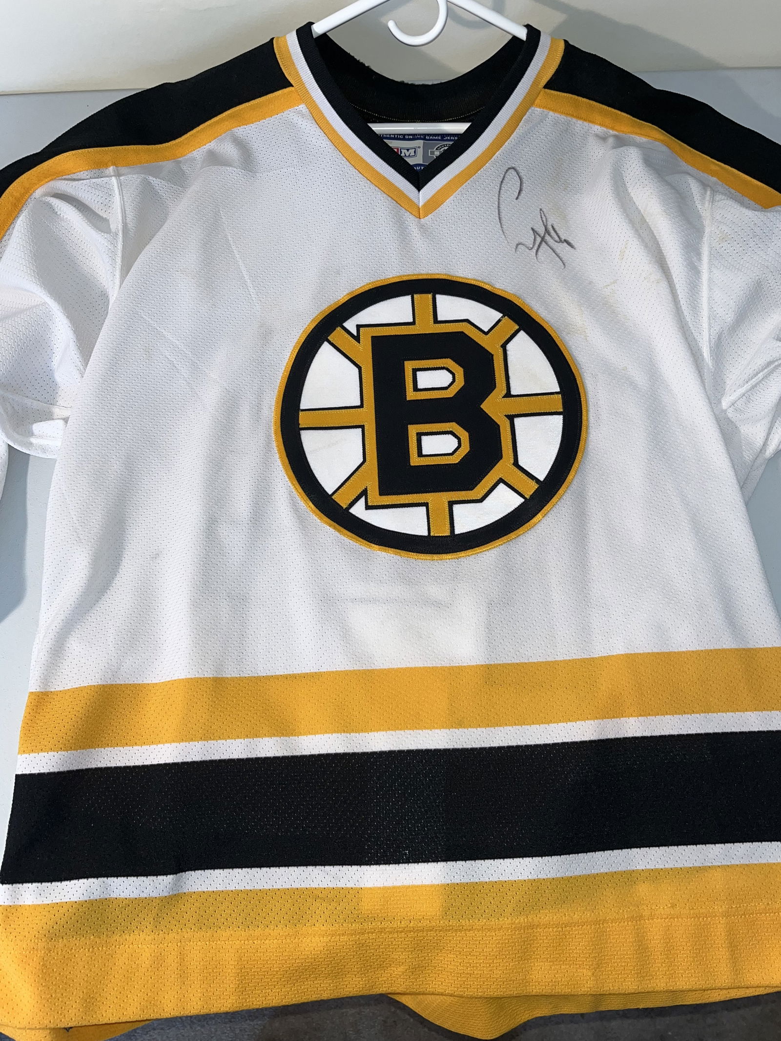 Signed Sergei Samsonov Boston Bruins CCM Authentic On-Ice NHL Jersey Size 48: This is an authentic CCM On-Ice Game Jersey for Sergei Samsonov, who wore number 14 for the Boston Bruins. The white home-style jersey is a size 48 and features the team's primary spoked B logo on the