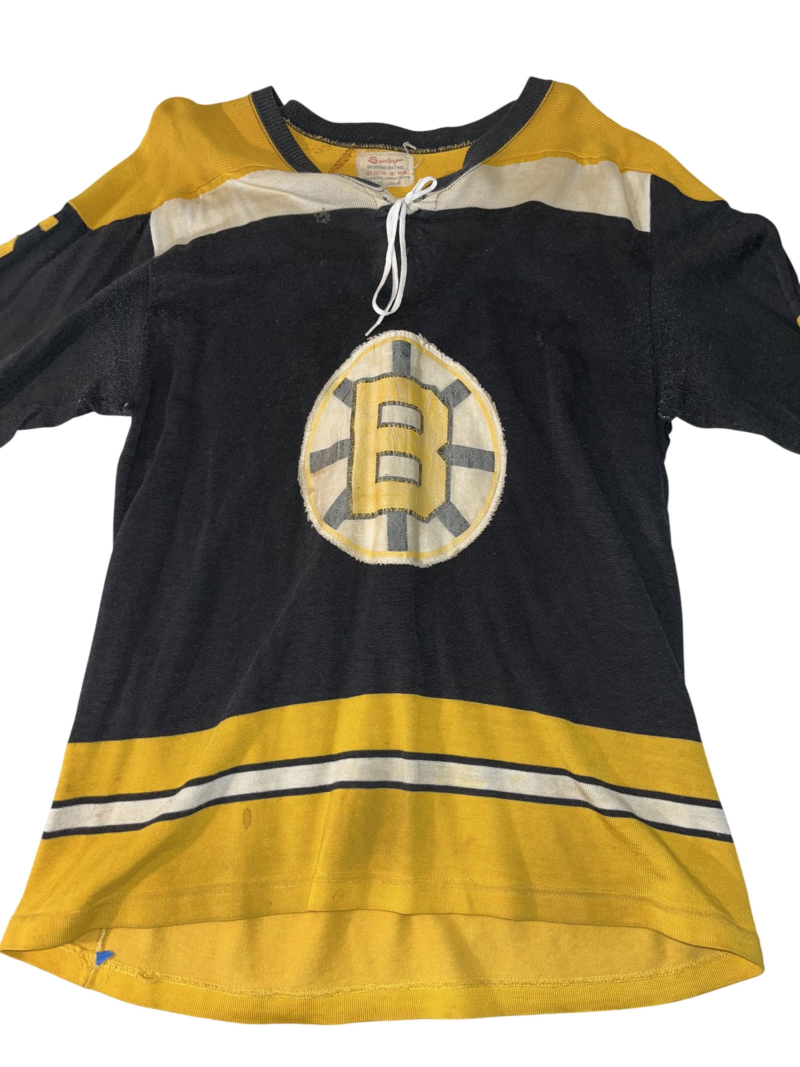 Vintage Boston Bruins Sandow Sporting Knit Hockey Jersey Number 5 Size Large: This vintage Boston Bruins hockey jersey was manufactured in Canada by Sandow Sporting Knit Inc. The garment is constructed from a 50 percent cotton and 50 percent rayon blend, which is a characterist