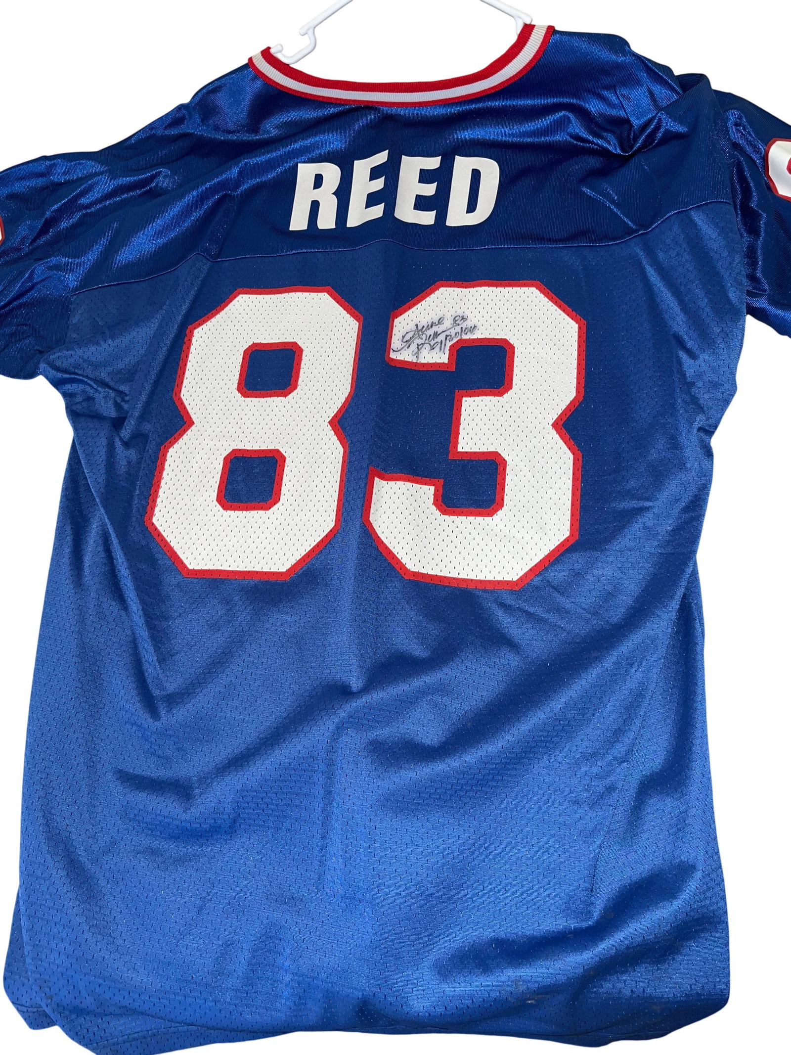Andre Reed Signed Buffalo Bills Jersey: Autographed Andre Reed Buffalo Bills Champion retail replica jersey, circa 1990s. Features a black felt-tip signature with 83 and date of 9/30/06 no third-party authentication provided. Size 48.