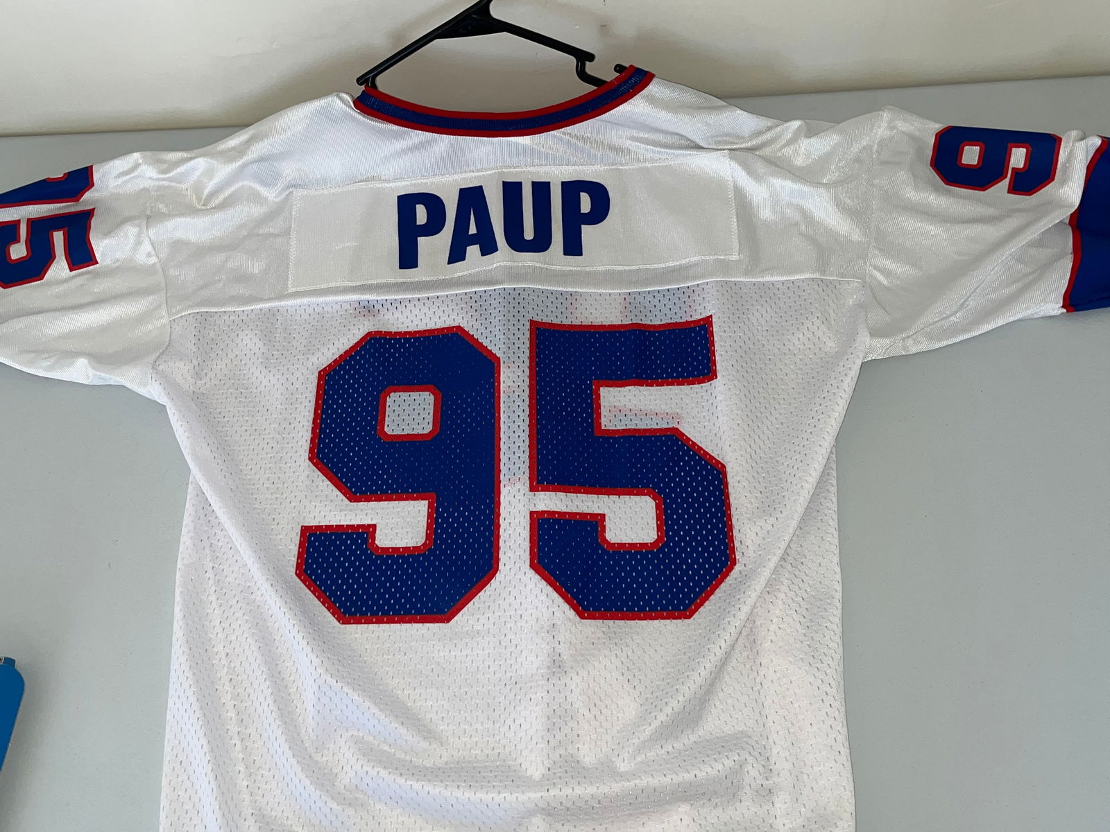 Bryce Paup Buffalo Bills Champion Replica Jersey, Size 48: This is a vintage 1990s Buffalo Bills "away" white jersey featuring former Pro Bowl linebacker and 1995 NFL Defensive Player of the Year, Bryce Paup. The jersey is manufactured by Champion and is a hi