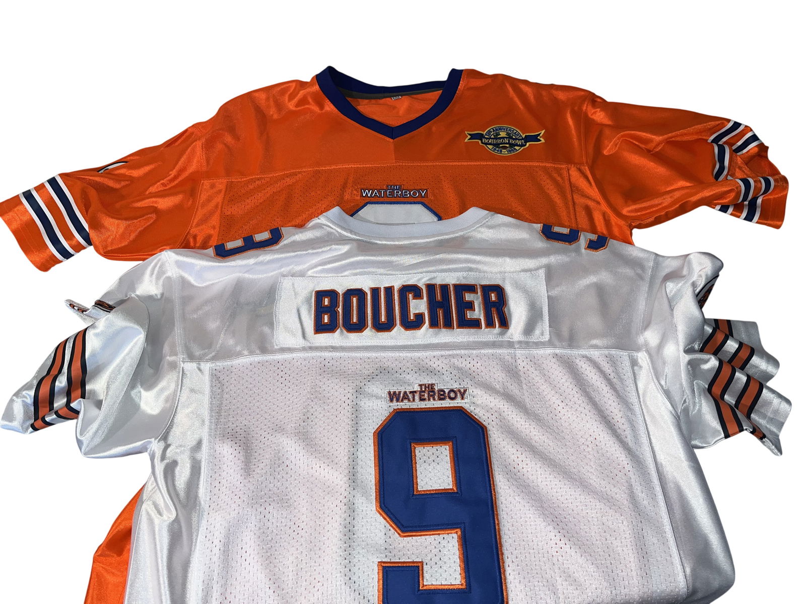 Bobby Boucher, A Pair of Replica SCLSU Mud Dogs Football Jerseys: Both are XL. This lot features a pair of high-quality fan replica football jerseys from the 1998 sports comedy film, The Waterboy. The jerseys represent the fictional South Central Louisiana State Uni