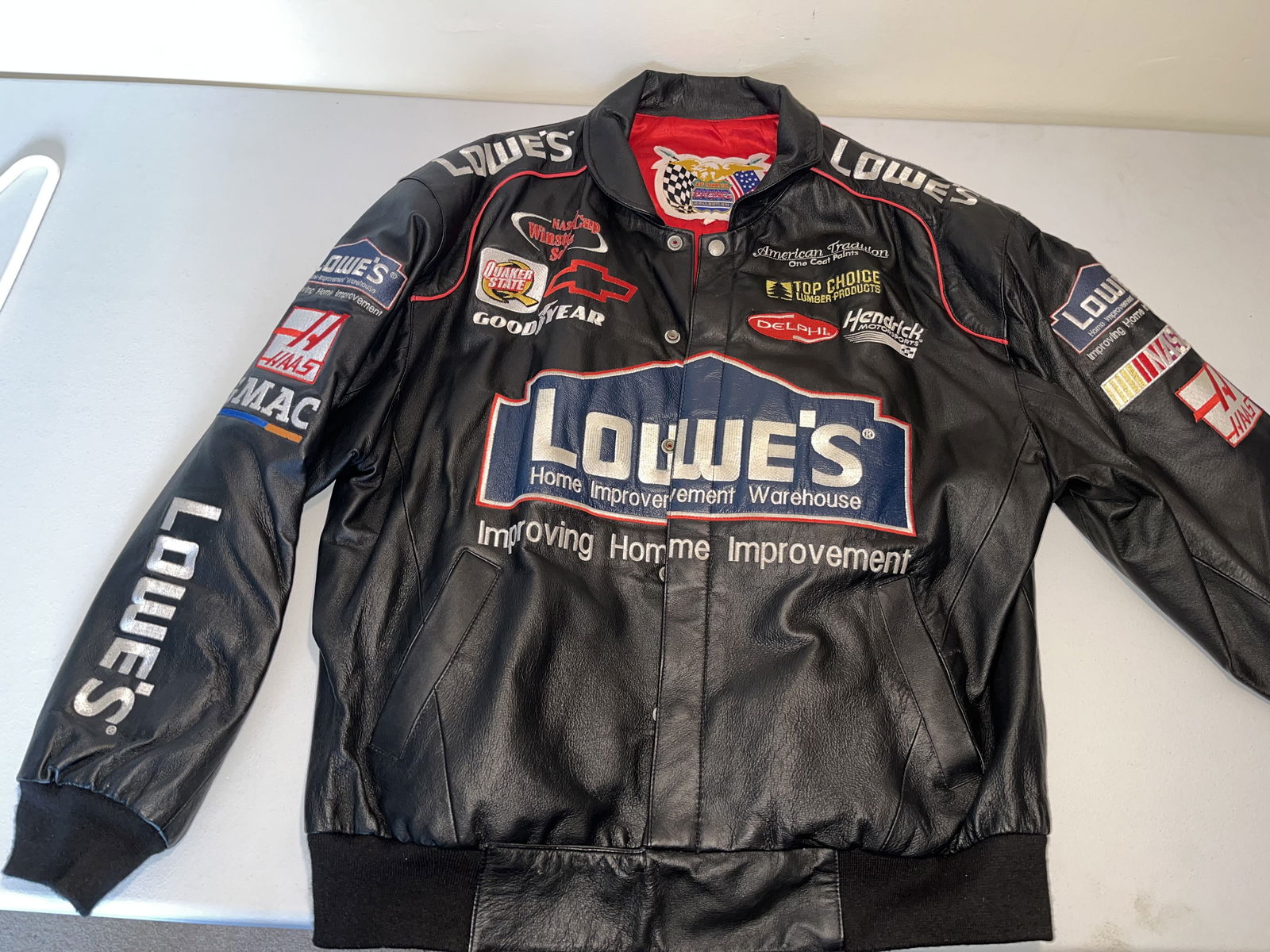 Jimmie Johnson NASCAR Hendrick Motorsports Jeff Hamilton Leather Racing Jacket: Appears to be XL. This is a premium heavyweight genuine leather racing jacket from the Jeff Hamilton Racing Collection, commemorating seven-time NASCAR Cup Series champion Jimmie Johnson during his te