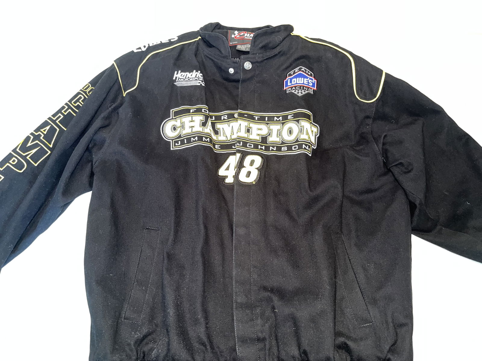 Chase Authentics NASCAR Jimmie Johnson 2009 Four-Time Champion Commemorative Jacket XL: This is a professional-grade NASCAR commemorative twill jacket produced by Chase Authentics in collaboration with Hendrick Motorsports. The garment is constructed with a 100 percent cotton shell and a